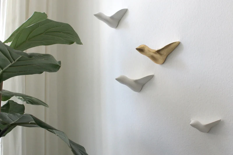 Wandskulptur - kleiner Vogelschwarm (4 Stk., weiß, gold)